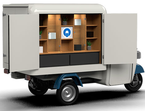 Piaggio ape shop with electric motor and retail set up for retail sales and product display
